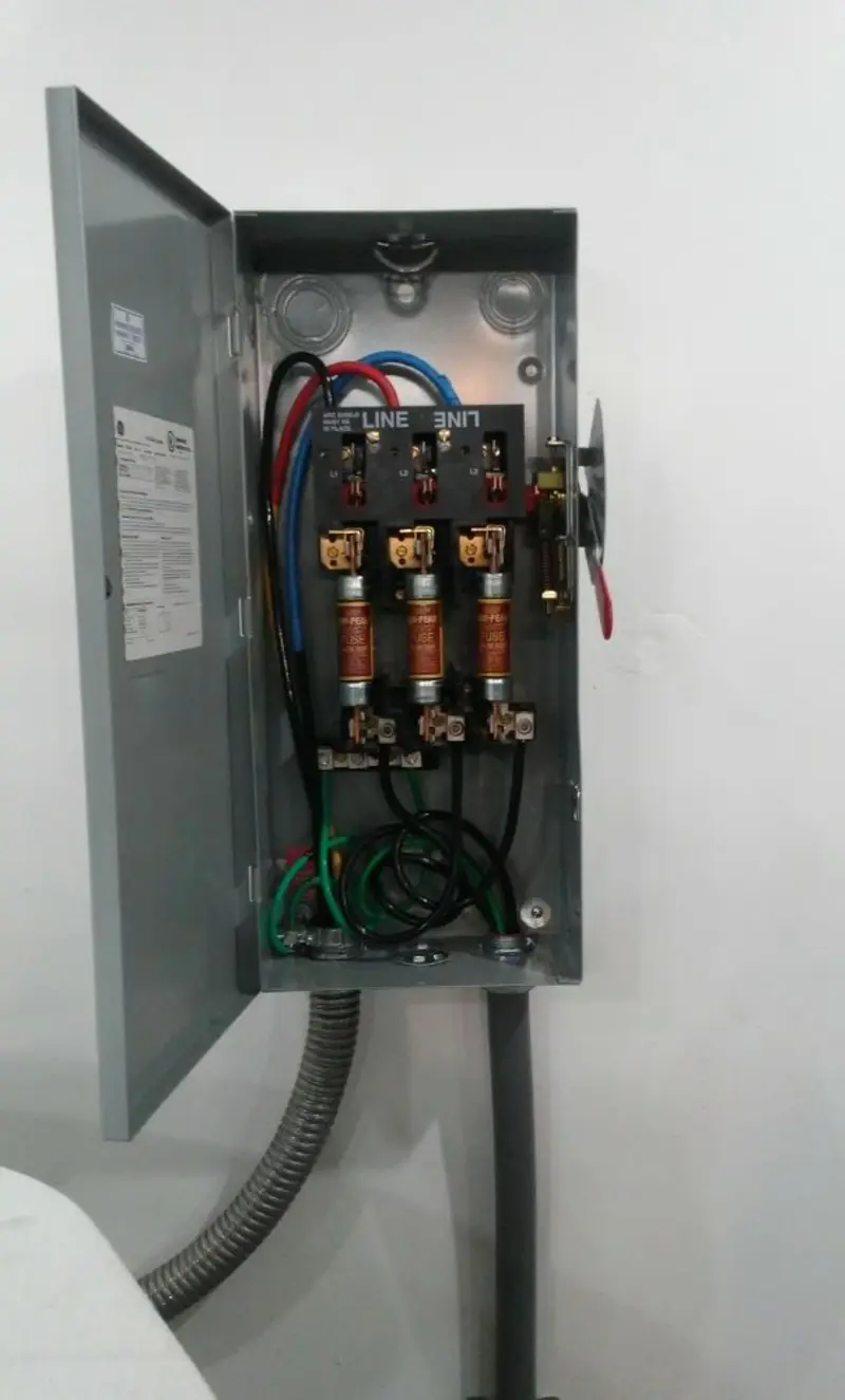 Three-phase disconnect switch installed for Smoke Detector Installation in Grass Lake