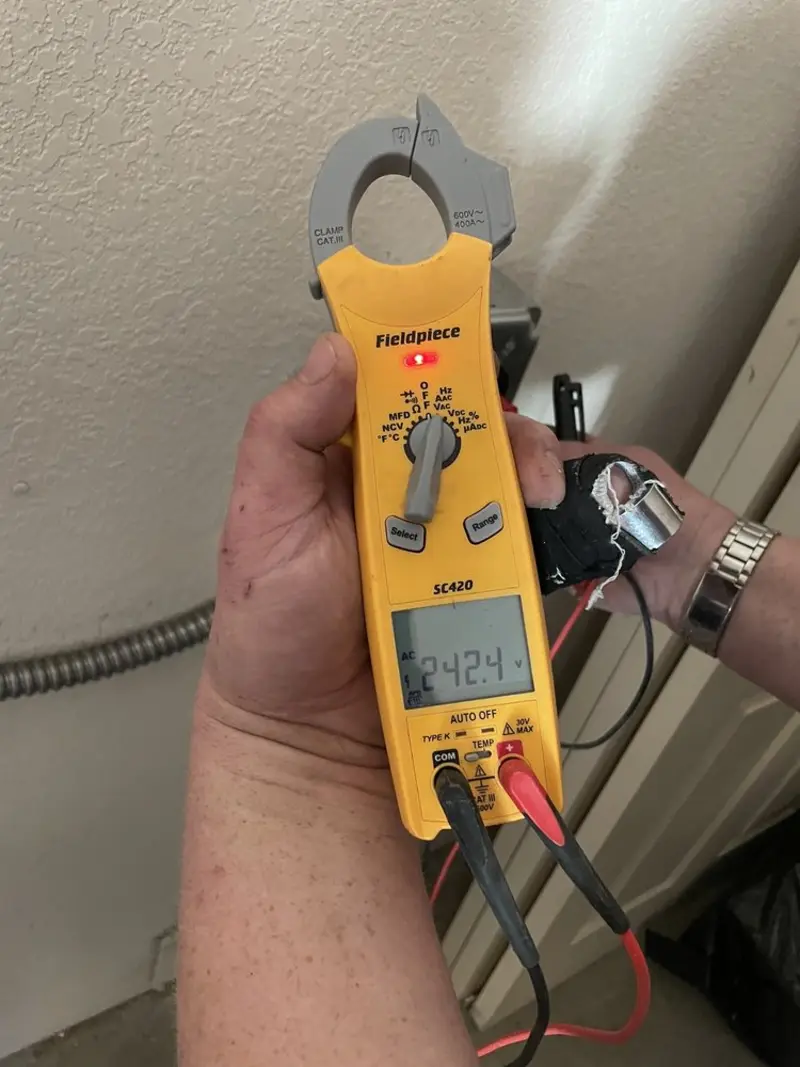 Voltage testing with clamp meter during Aluminum Wiring Replacement in Grass Lake